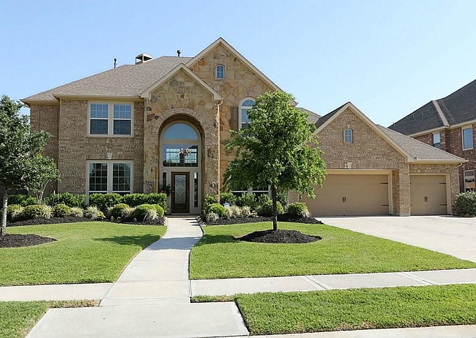 This is a dream home come true! Large lot backing to a greenbelt providing you lots of privacy and e