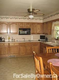 Kitchen
						:
						Updated 6 years ago with new cabinets, countertops, dishwasher, microwave, range
