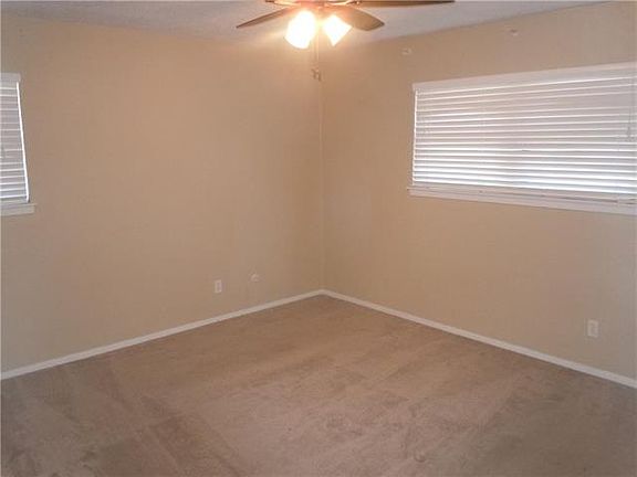 LIVING ROOM OPEN TO DINING ROOM