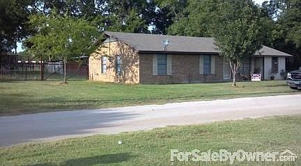 Front yard
						:
						view with 16x12 shop in fenced in back yard. trees, pecan trees on far side