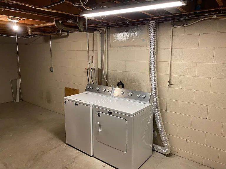 Newer Maytag washer & dryer in basement