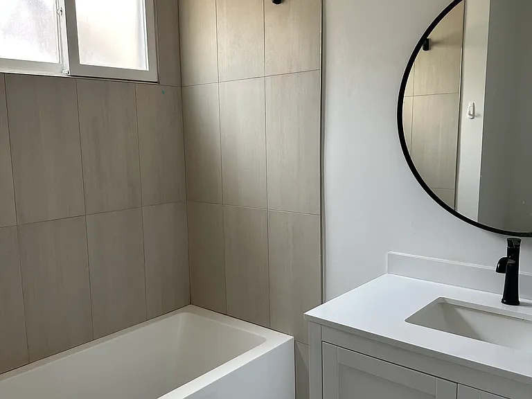 Newly tiled bathroom and fixtures