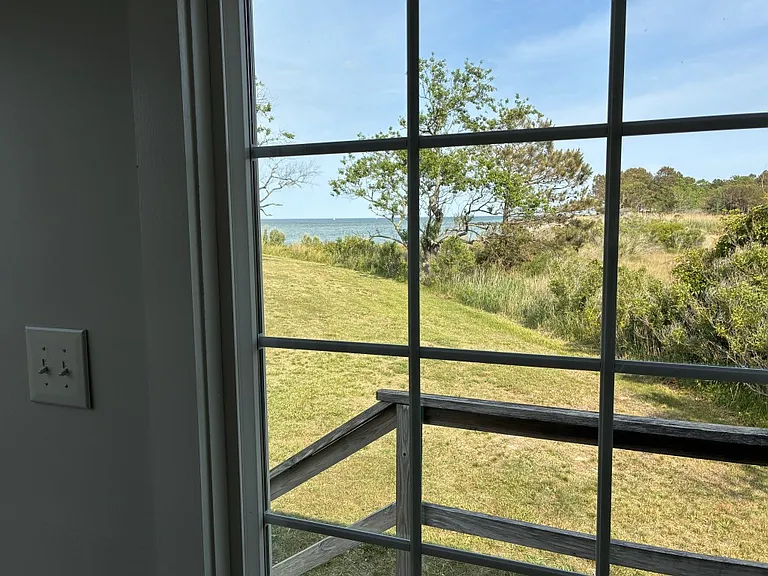 View from sliding glass doors and deck looking toward beach