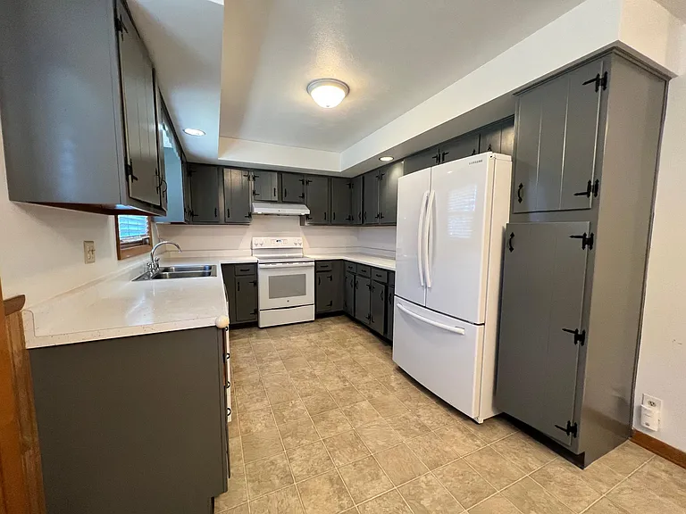 newly painted kitchen cabinets, Samsung fridge, dishwasher