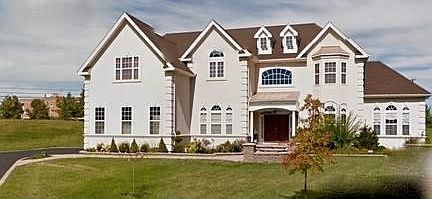 2 Degas Front
						:
						Double Door Entry with Porch and Side Load Garage, Paver stone walkway