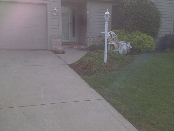 Brick, and cedar siding