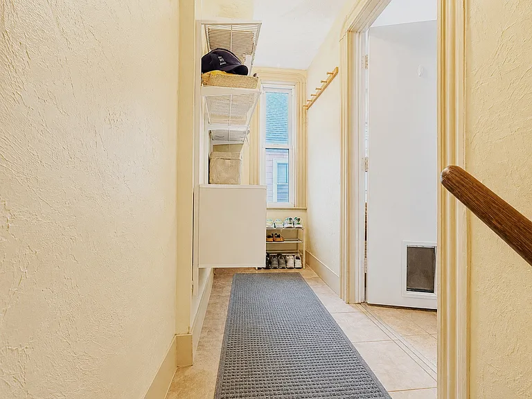 Back stair mud room area off the kicthen