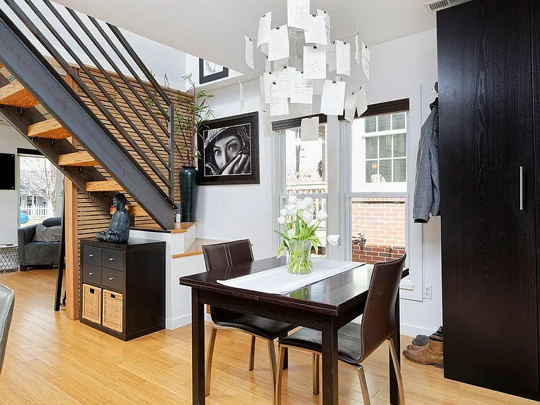 Professional photo from previous listing, light fixture is different.