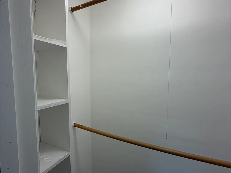 one of two closets in master bedroom