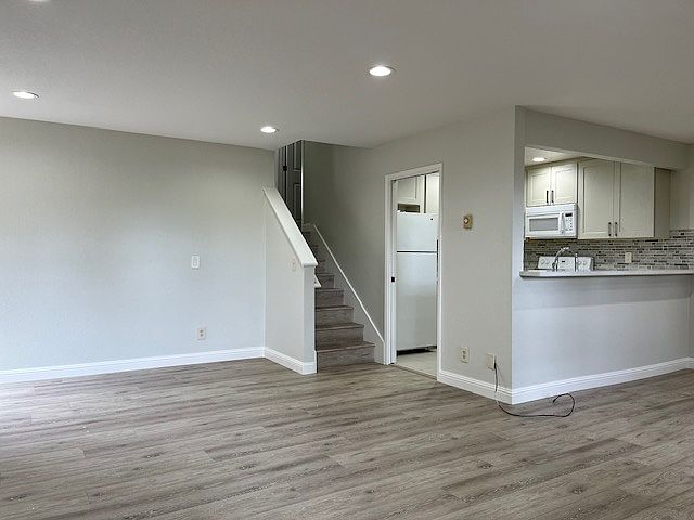 Living room w/view of kitchen