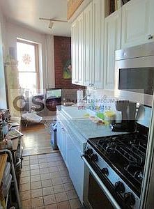 5th image of 346 E 10th St APT 6