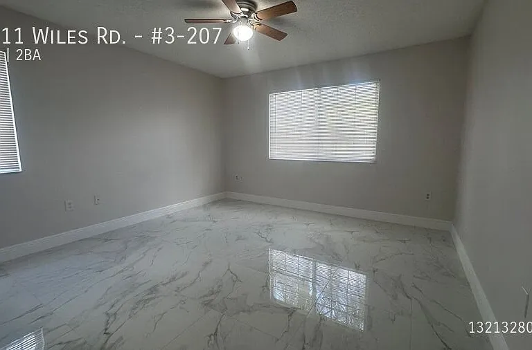 5011 Wiles Rd #3-207 — Photo 38