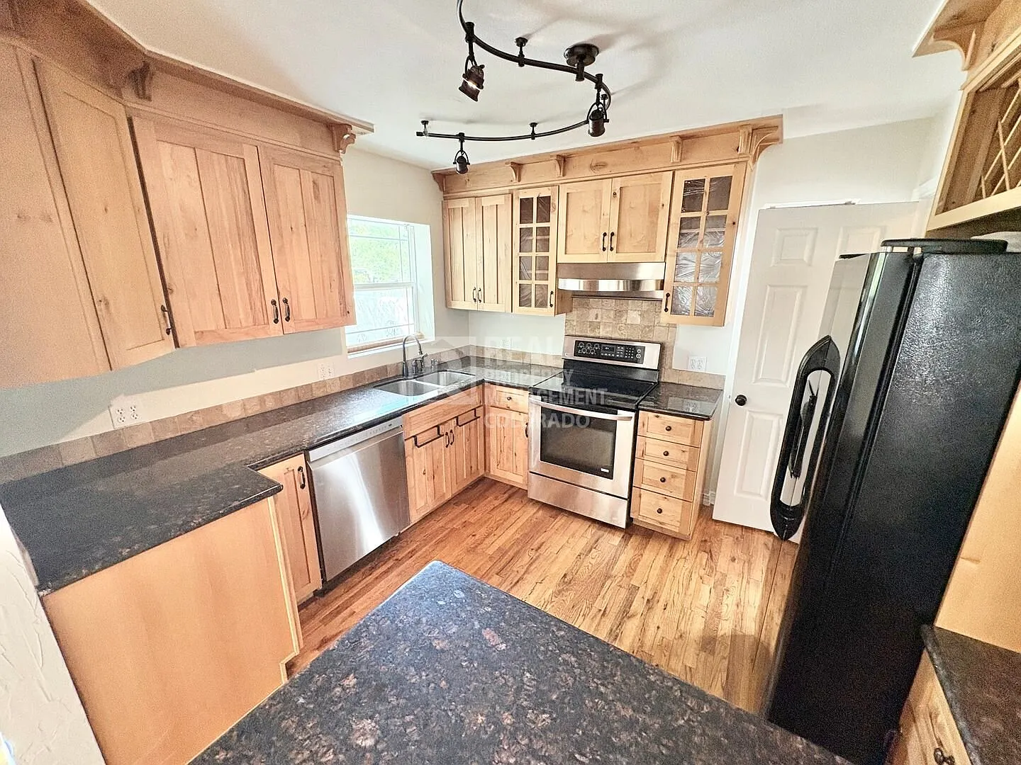 Spacious 4-Bedroom Home with Finished Basement & 2-Car Garage — Photo 4