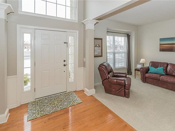 Two story entry with genuine hardwoods.