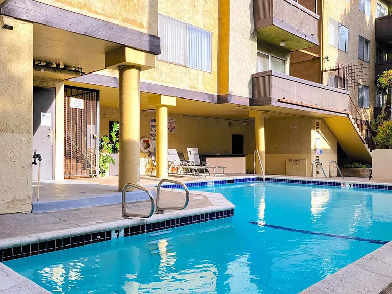 Pool and sunbathing area