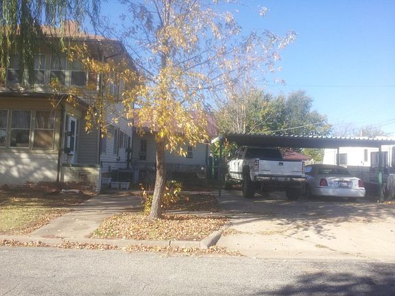 SIDE VIEW OF CARPORT