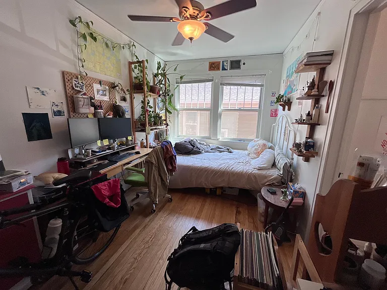 This is a different unit's bedroom. Available unit bedrooms are nearly identical, but are carpeted.