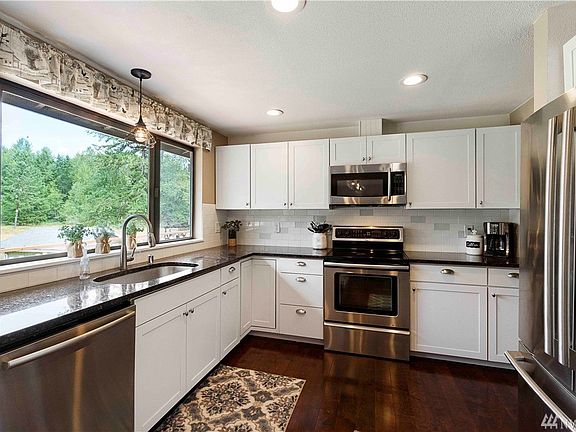 Enjoy the view of your own property through the large window. 