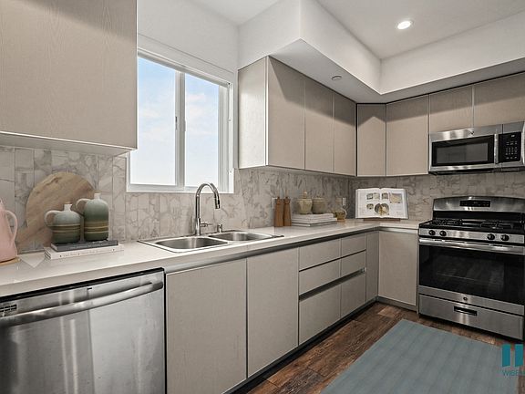 Full-Size Kitchen with Energy-Effcient Appliances and Ample Cabinet Storage