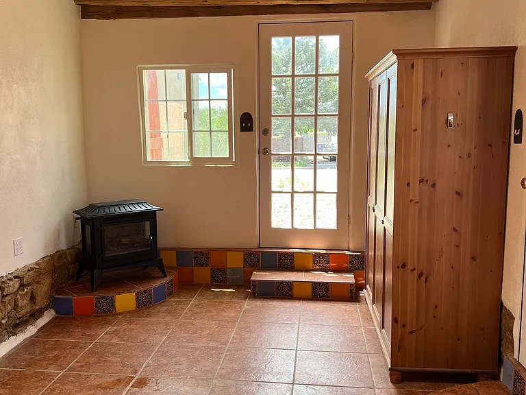 Studio facing the driveway entrance.