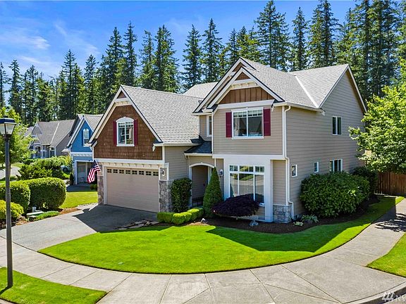 Amazing landscaping, check out the massive hydrangeas!  Fully fenced. 