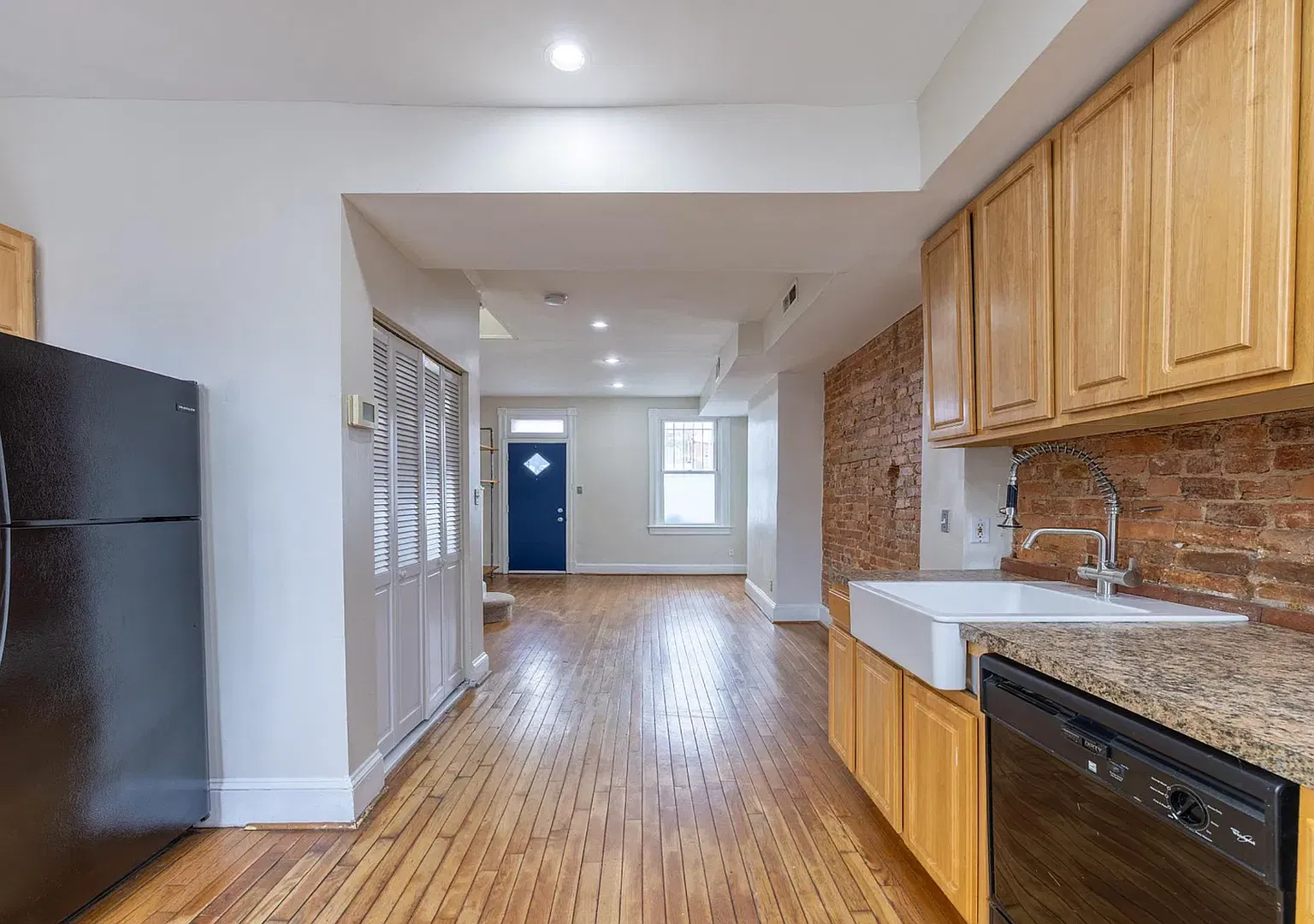 Charming 2BR Near Northeast Home with Exposed Brick & Hardwood Floors — Photo 4