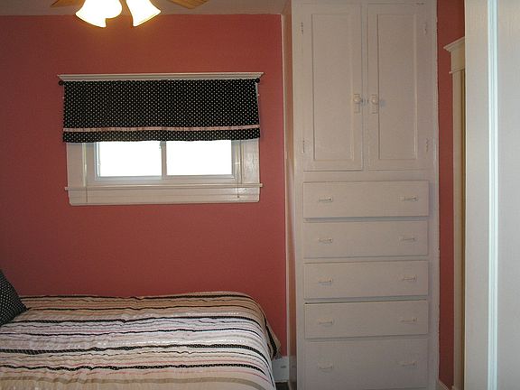 Bedroom with built in drawers