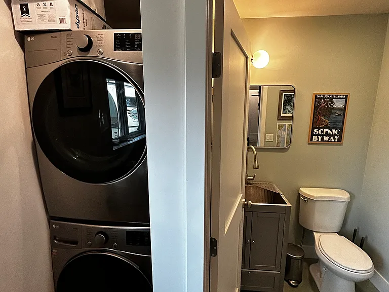 Washer/dryer next to 1/2 bath