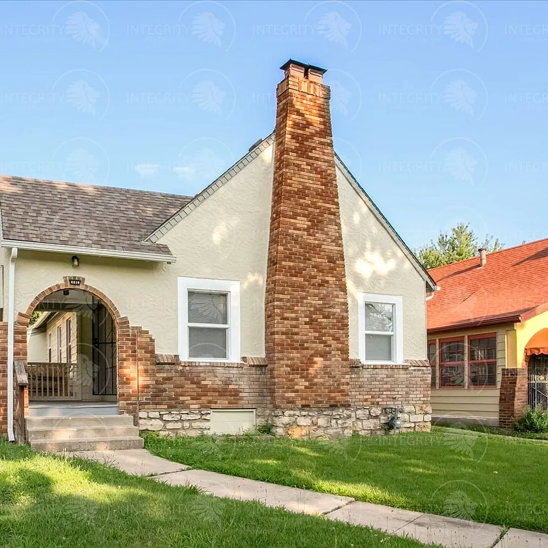 Charming 2 Bedroom Tudor Bungalow with Character to Spare! 6210 Agnes Ave, Kansas City, MO 64130 — Photo 1