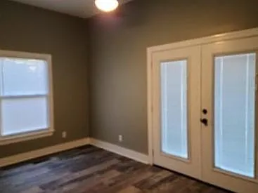 Large rear bedroom with atrium door