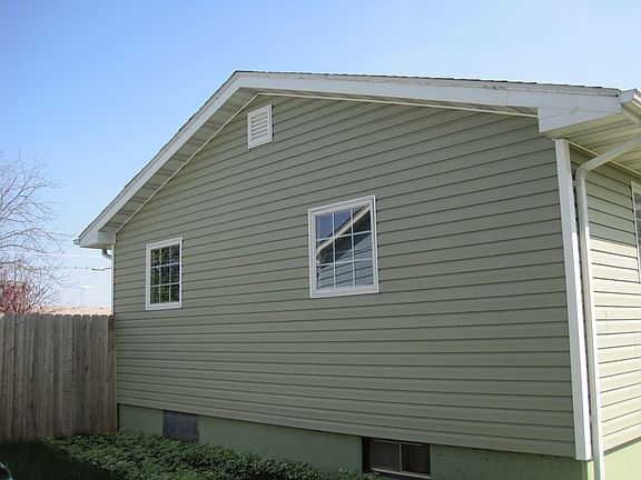 Far left side of the house* note the nice anderson windows*
