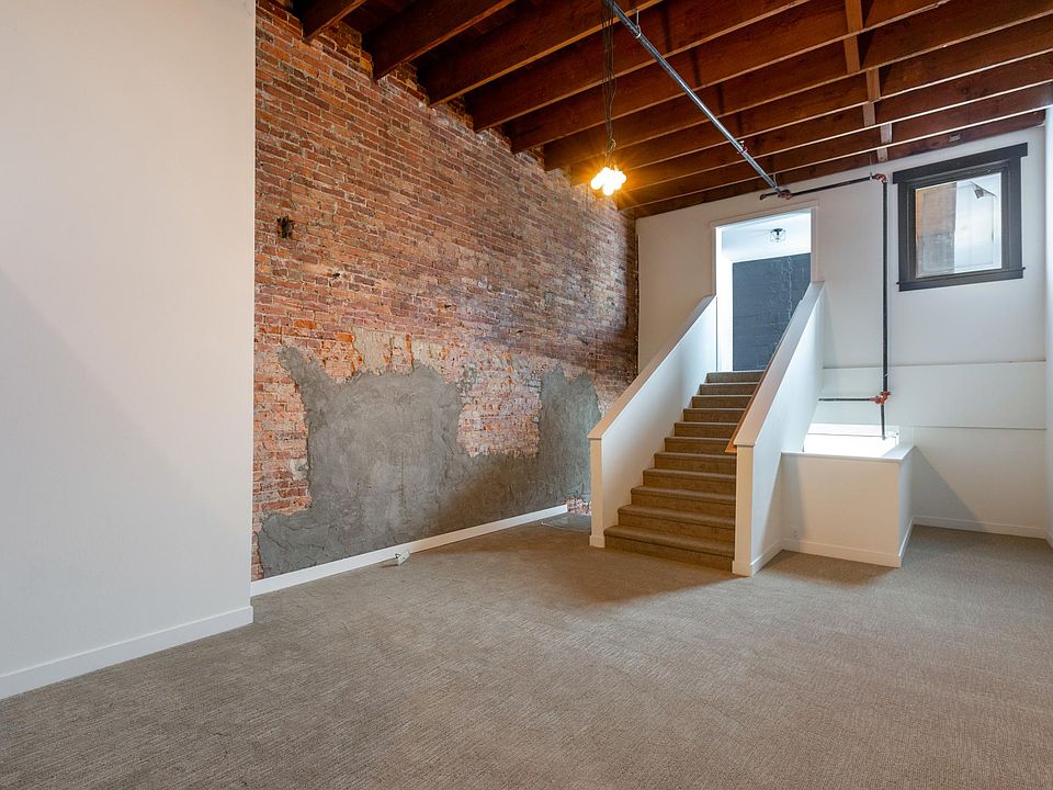 Loft bedroom with bonus room above