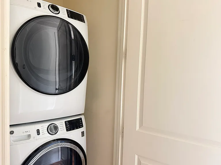 In-unit, newly purchased stacked washer and dryer
