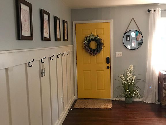 Front entrance with board & batten wall for coats