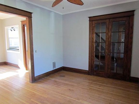 VIEW OF LIVING ROOM INTO DINING ROOM