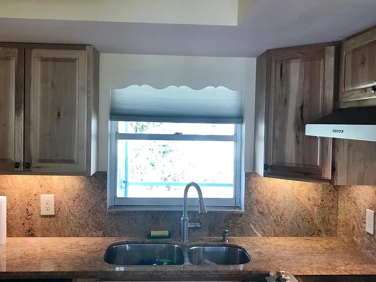 Look up. nice light fixtures. Extra small lights around counterspace.