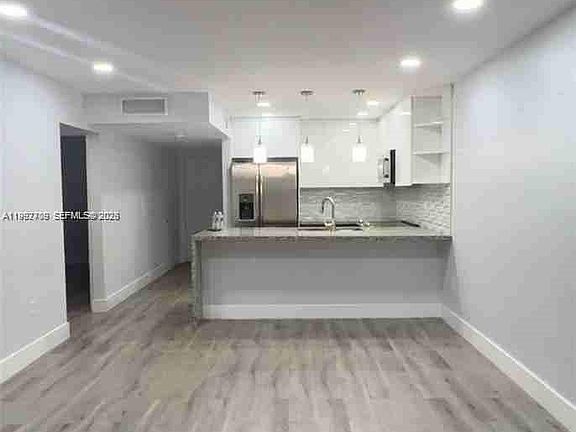 2nd image of 1555 W 44th Pl APT 247