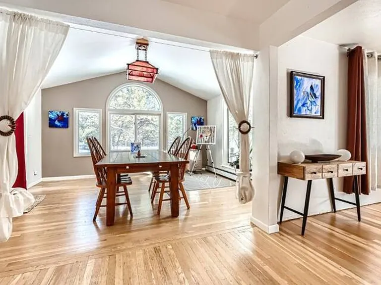 spacious open floor plan hardwood floors and large dining room and kitchen. Fully furnished move in ready
