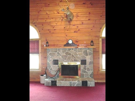 And a rustic stone, wood burning fireplace to warm those chilly nights.