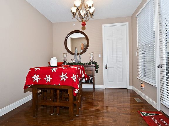 Separate dining room with hardwood