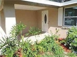 Covered sitting area in front.