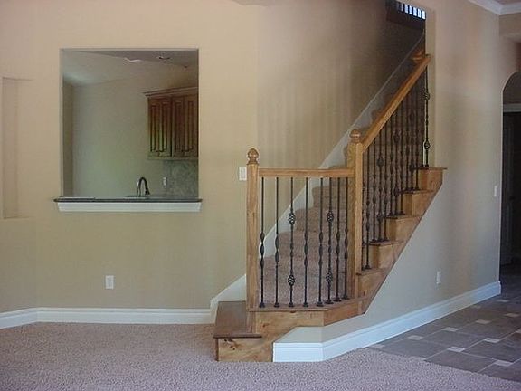 Stairs with pass thru to Kitchen