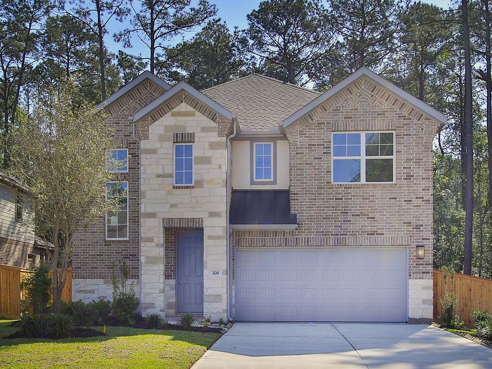 Sophisticated brick facade with stone accents defines elegance in The Woodlands Hills. Expansive win