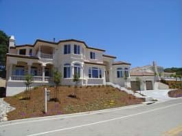 Exquisite Custom Home overlooking private lake.