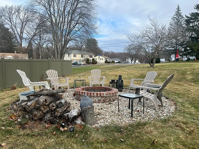Fire pit on the right side yard.