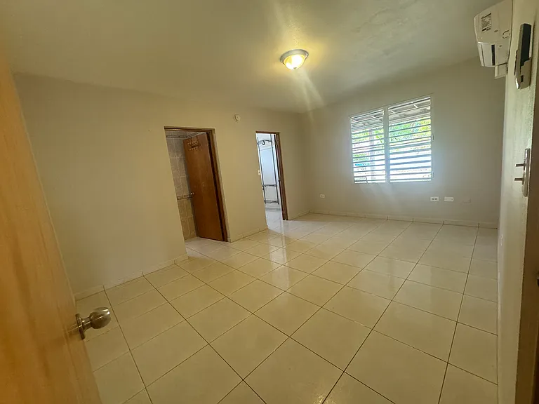Master bedroom #1 with attached bathroom and walk in closet. AC