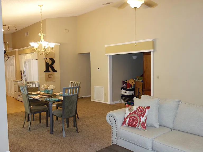 Great Room, Dinning Room, Bonus Room and kitchen entry is to the left of the "R". Bedroom #2 and #3 are in the back hall with bath #2 and laundry area.