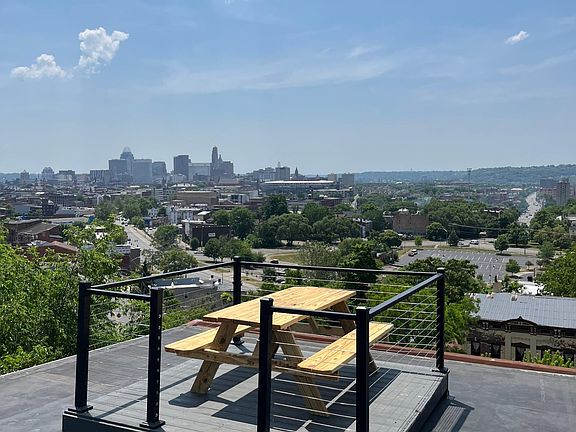 Terrace overlooks Music Hall, downtown and Union terminal with views of Clifton from the backside