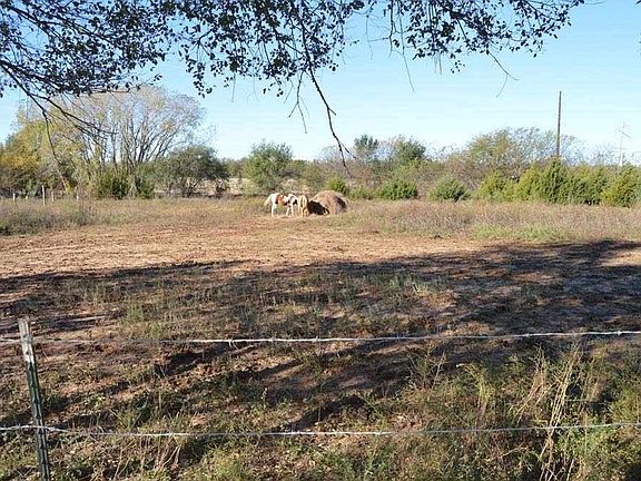 Land to west of home.