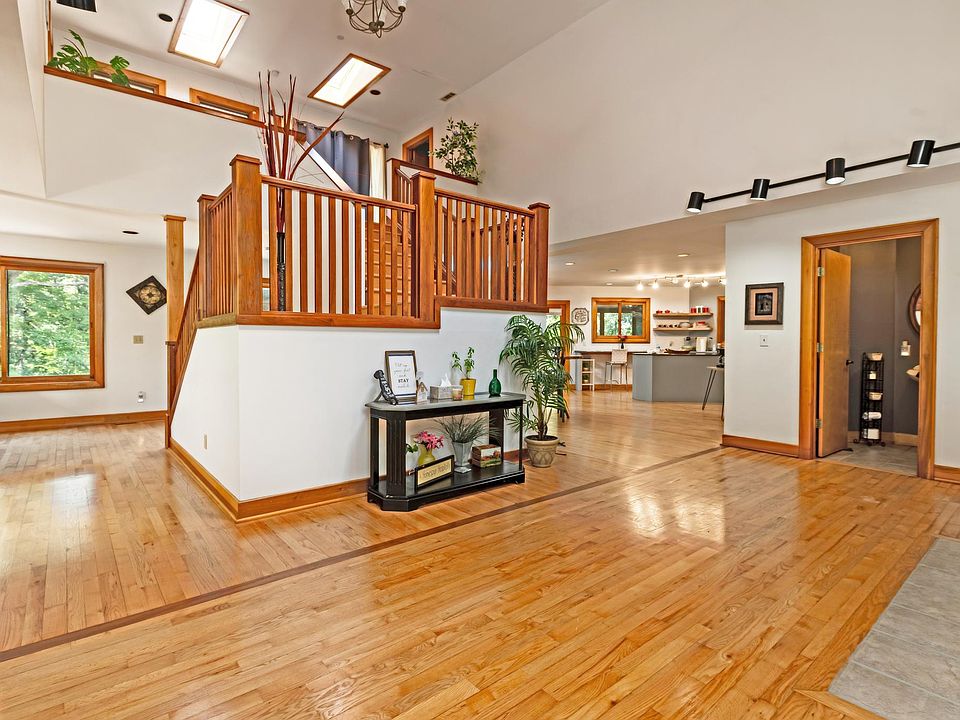 Front entrance, 1/2 bath and kitchen shown here as well.